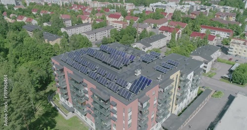 Midday Aerial View Of Apartment House with solar panels on roof in residential area of Lahti, Finland, Point of Intrest