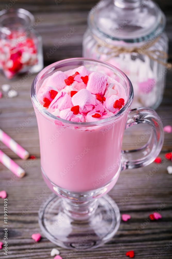 Pink hot chocolate with marshmallow and sugar hearts in a glass mug for Valentine Day Pink hot chocolate with marshmallow and sugar hearts in a glass mug for Valentine Day