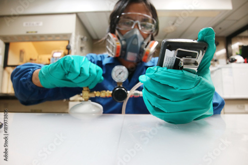 Instrument technician is take standard gas for the job calibrate or function check of personal gas tester or gas detector.