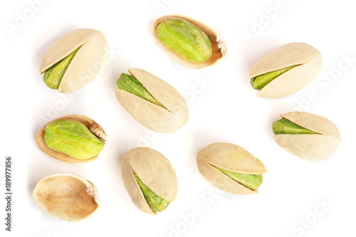 Pistachios isolated on white background, top view. Flat lay photo