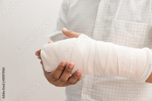 Arm of man splint mild injuries from accidents. photo