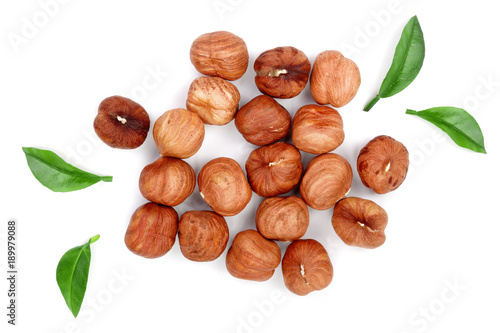 Hazelnuts with leaves isolated on white background. Top view. Flat lay