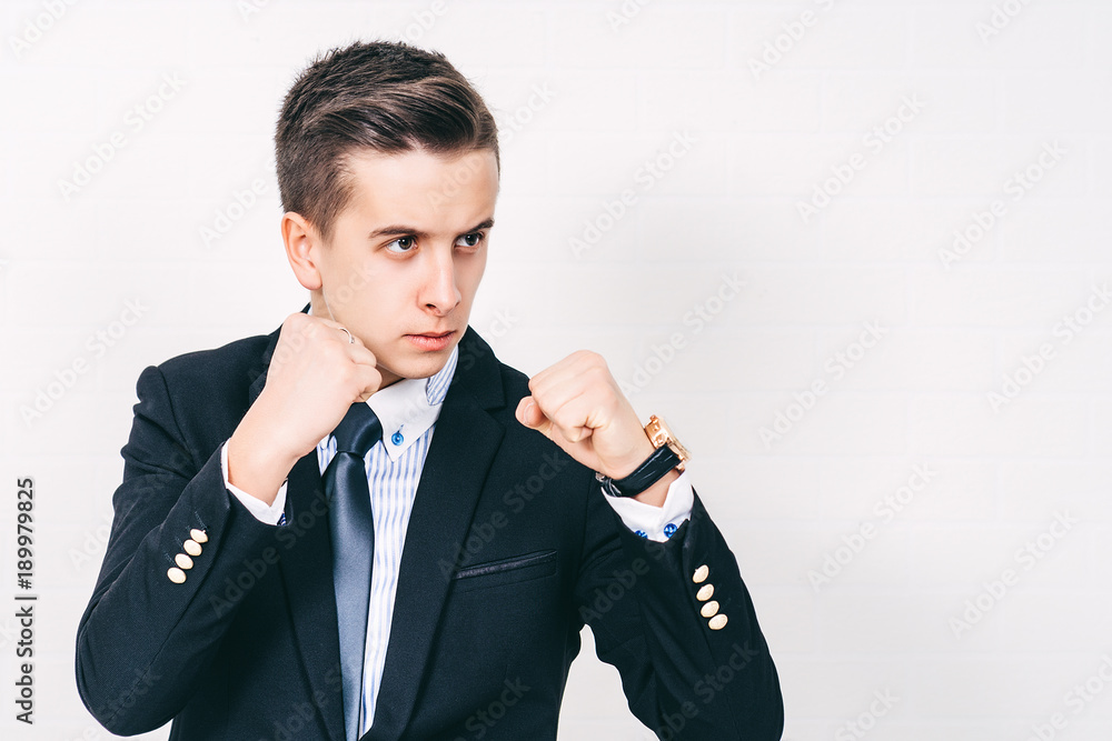 Young business man boxing on white background. Young business man boxing on white background.