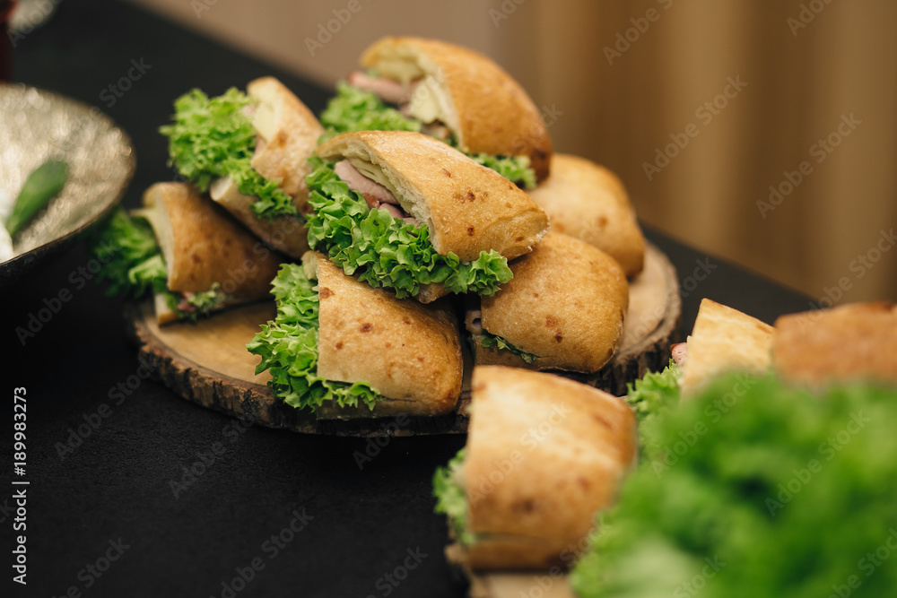 sandwiches from ciabatta with salad sandwiches from ciabatta with salad