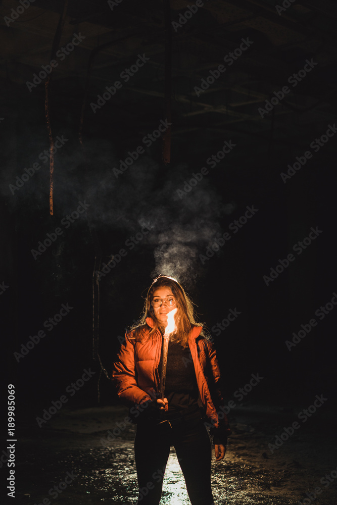 Woman with lighting torch at night Woman with lighting torch at night
