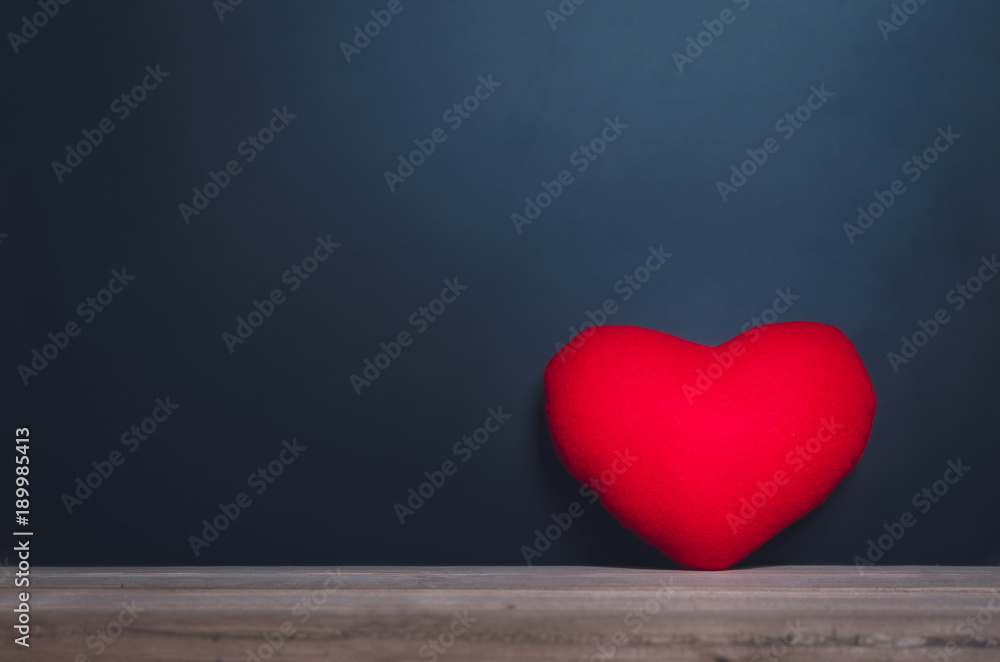 Fototapeta premium red heart love on wood table with blackboard. love concept. valentine day.