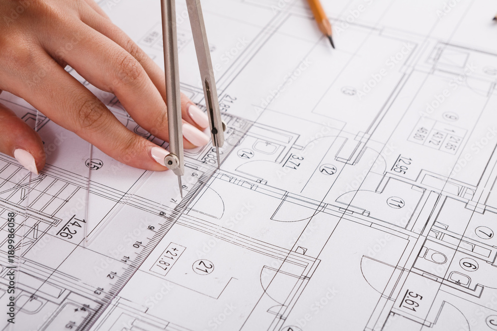 Architect drawing architectural project closeup Architect drawing architectural project closeup