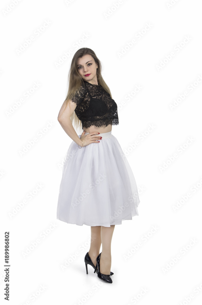 Girl in white skirt posing. Girl in white skirt posing.