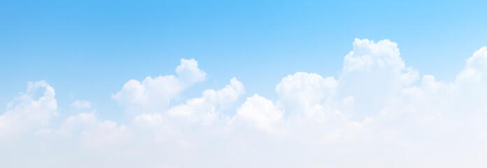 White cumulus clouds formation in blue sky