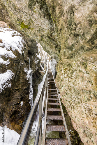 Slovakia national park Mala Fatra, Janosikove diery, path in the forest, snow and winter.