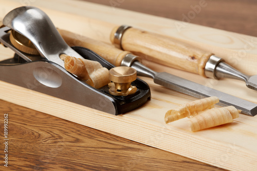 DIY concept. Woodworking and crafts tools. Carpentry hand tools. Planers, chisels, measuring tools. Wooden background.