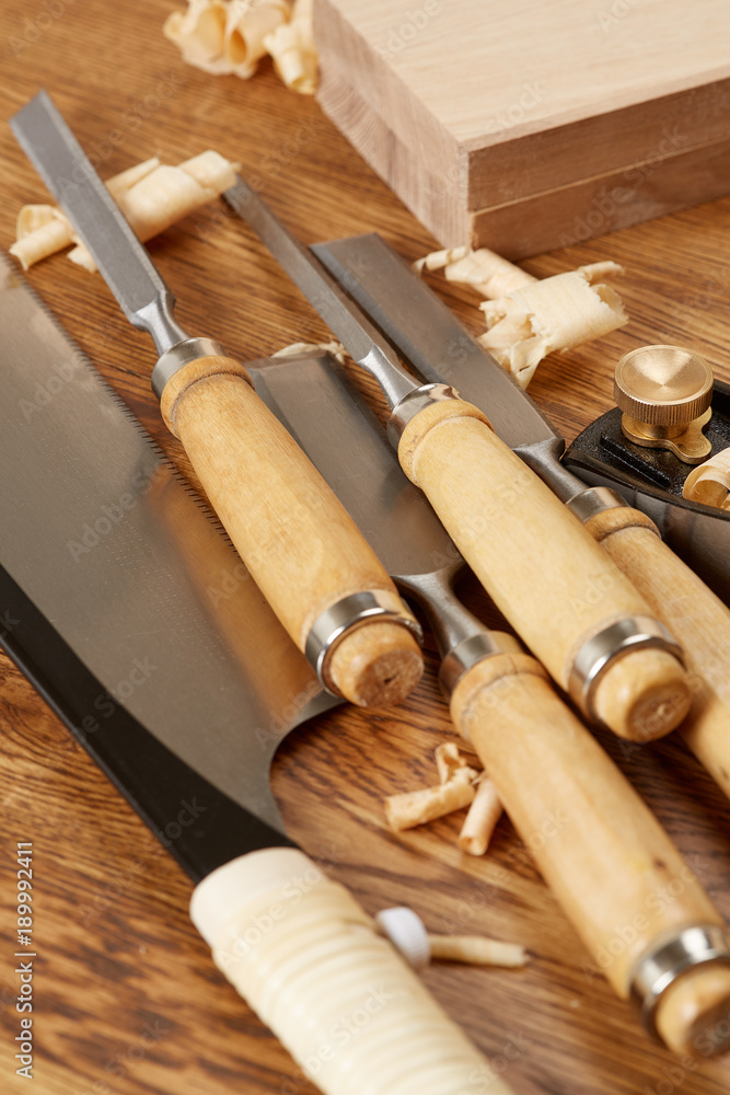 DIY concept. Woodworking and crafts tools. Carpentry hand tools. Planers, chisels, measuring tools. Wooden background.