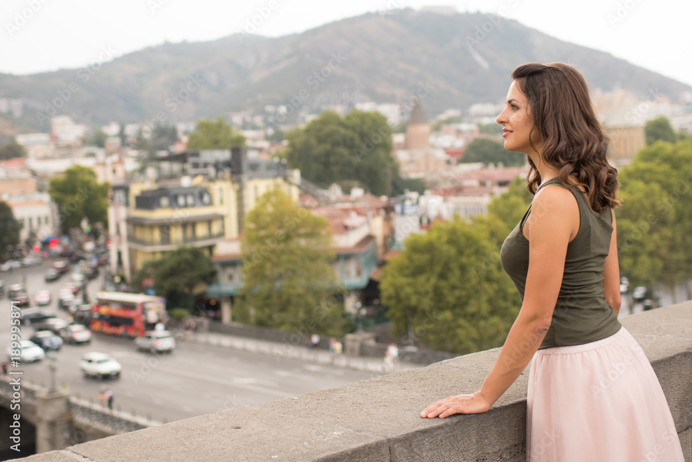 girl is walking around the city