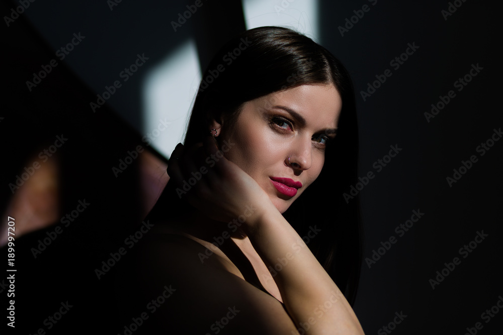 Sexy young woman posing in a natural lighting