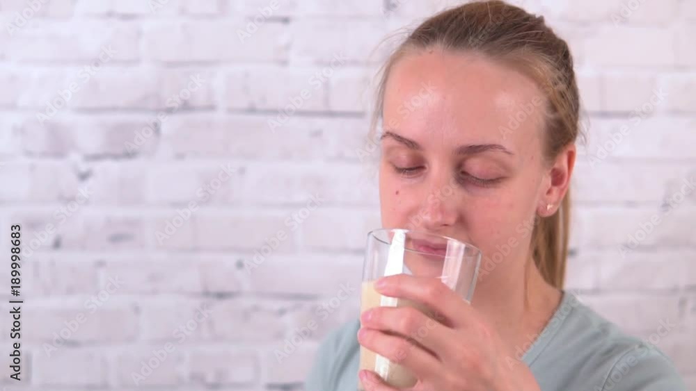 Woman with healthy diet protein shake drinking for sport and fitness