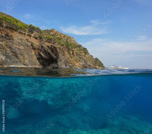 Over and under water surface, cliff with rocks underwater, Mediterranean sea, Cap Norfeu, Costa Brava, Spain, Cap de Creus, Girona, Catalonia