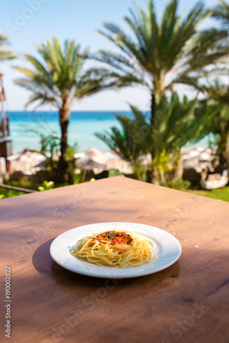 Pasta on the background of the sea. photo
