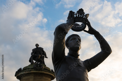 William Shakespeare and Henry V with blue sky in background in Stratford upon Avon