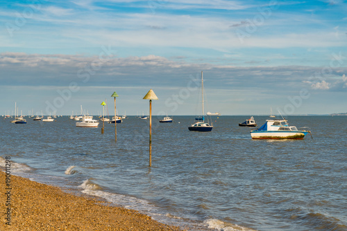 Obraz na płótnie Boats on the shore of the River Thames, seen in Southend-on-Sea, Essex, England, UK w salonie