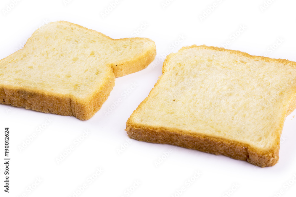 Slices of bread for toasting on a white background Slices of bread for toasting on a white background