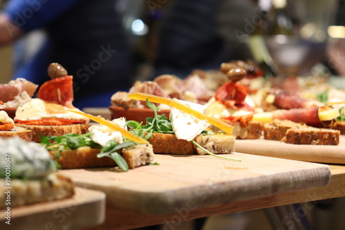 wooden tray of cheese tapas
