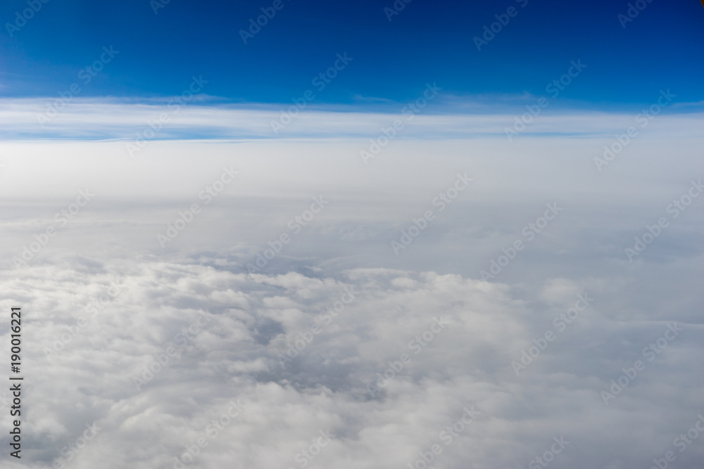 Clouds, view from the window of airplane flying in the clouds Clouds, view from the window of airplane flying in the clouds