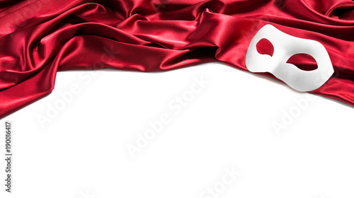 Obraz na plátne White theatre mask on red silk fabric