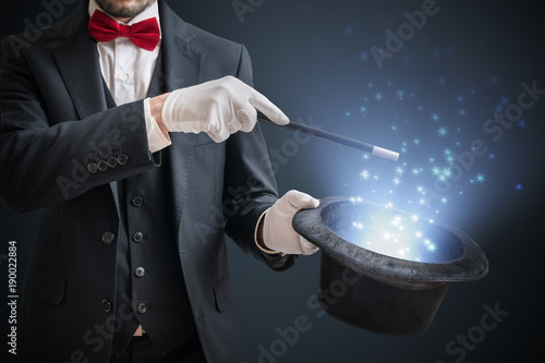 Magician or illusionist is showing magic trick Fototapet