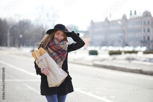French woman with baguettes in the bag  © alexkich