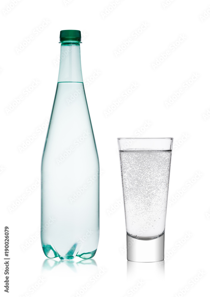 Bottle and glass with healthy sparkling water Bottle and glass with healthy sparkling water