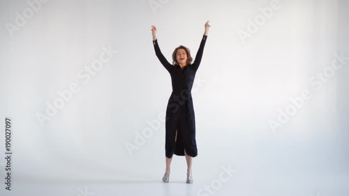 Wallpaper Mural Pleased female in fluttering long dress dancing Torontodigital.ca