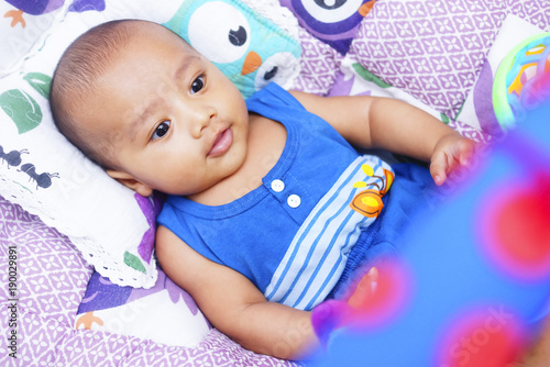 Happy Baby Boy Playing With Baby Play Gym