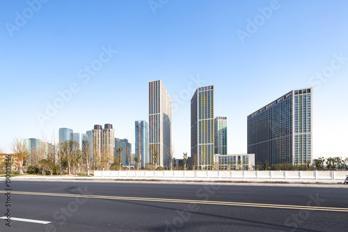 modern buildings near road in modern city © zhu difeng