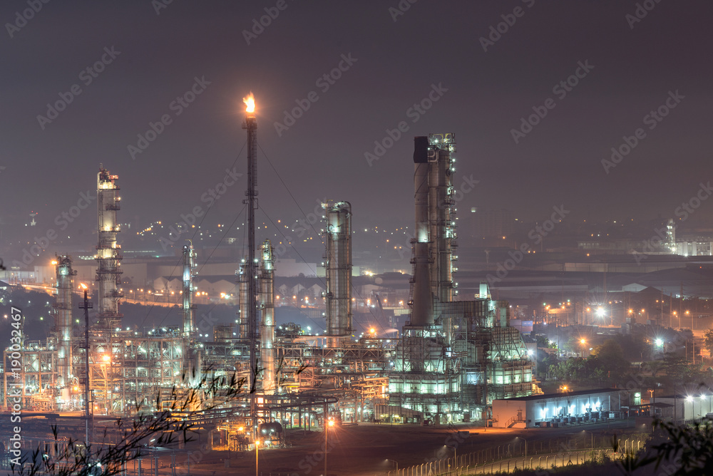 Oil refinery or chemical plant at Blue night sky