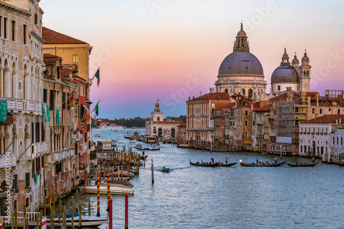 Sunset view of the iconic 17th-century Santa Maria di Salute Basilica on the Grand Canal in Venice © SvetlanaSF