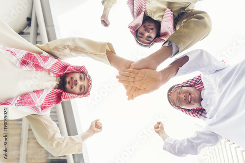 Arab man Teamwork Shake Hands Partnership Concept.