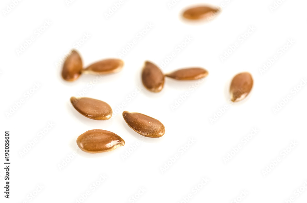 Close up of flax seeds isolated on white background