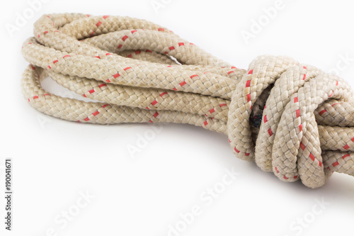 Old rope isolated on white background, closeup