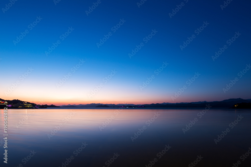 beautiful scene of lake at sunset