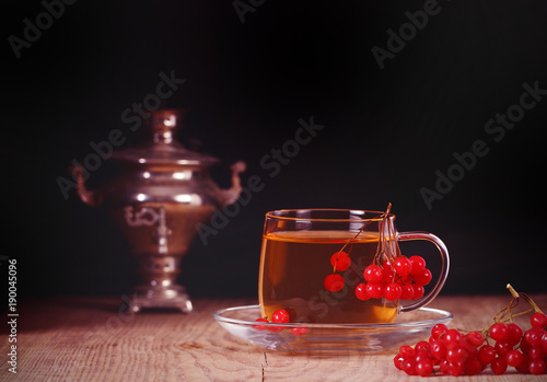 калина ягода свежая лежит столе рядом стоит чай