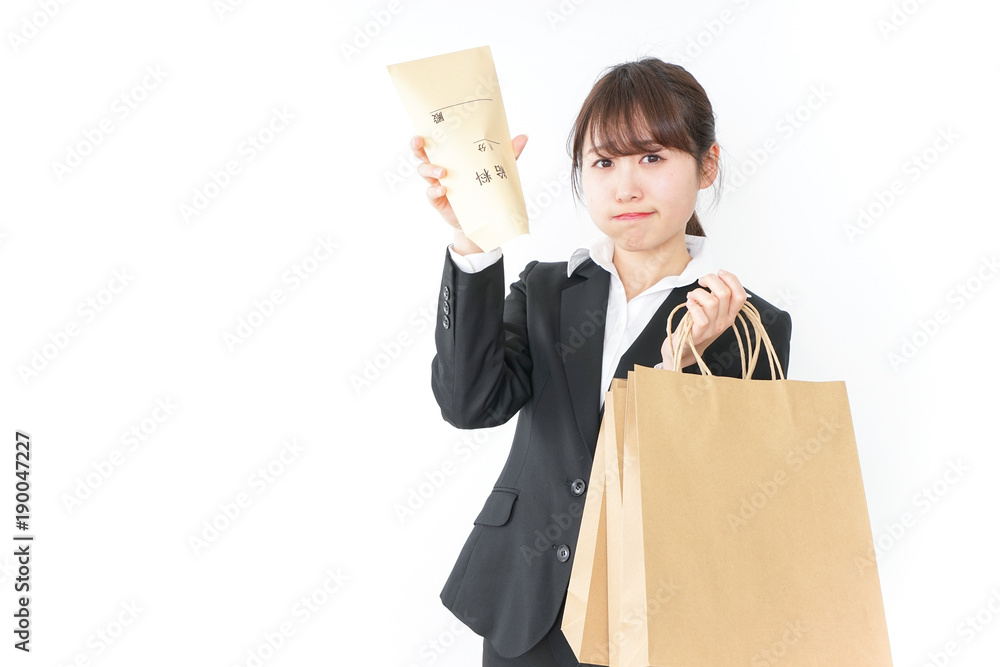 給料を使い切る女性・低賃金・貯金イメージ