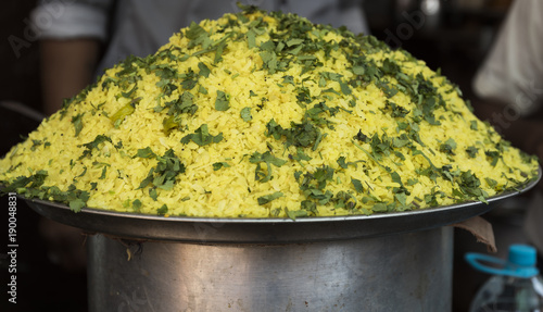 Batata Poha / Indian breakfast with potatoes and flattened rice in Nathdwara, Rajasthan India