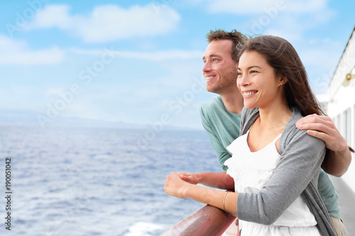 Happy interracial couple on cruise ship holiday