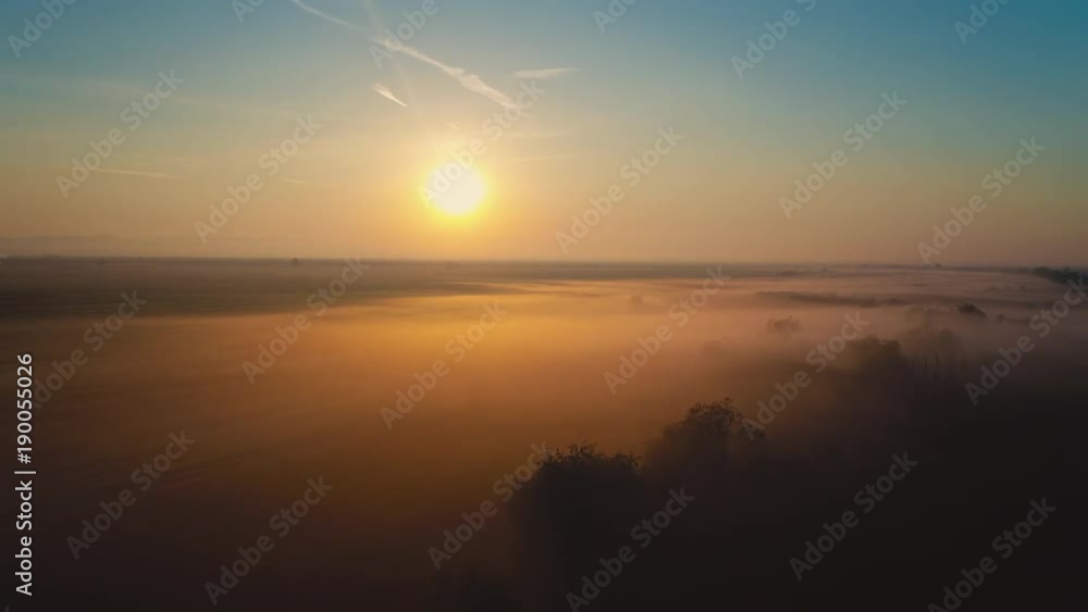 Aerial drone view over the sea water. Beautiful sunrise over the beach Aerial drone view over the sea water. Beautiful sunrise over the beach
