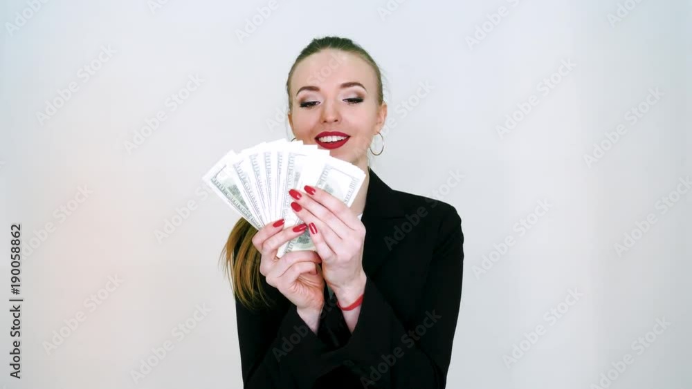 Woman Corporate Business Employee Holding Dollar Banknotes Tightly. Woman Corporate Business Employee Holding Dollar Banknotes Tightly.