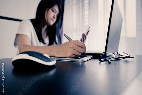 Hand of asian woman using mobile phone serching for online shopping concept photo