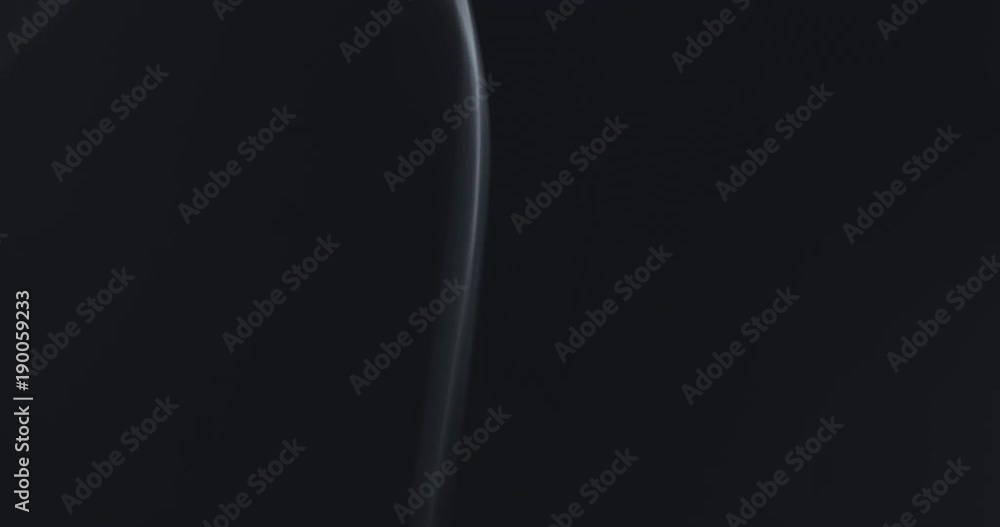 smoke rising over black background in slow motion smoke rising over black background in slow motion