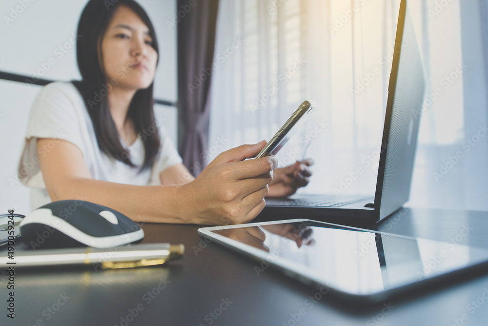 Close up of hand woman holding credit card and using mobile phone serching for online shopping concept Close up of hand woman holding credit card and using mobile phone serching for online shopping concept