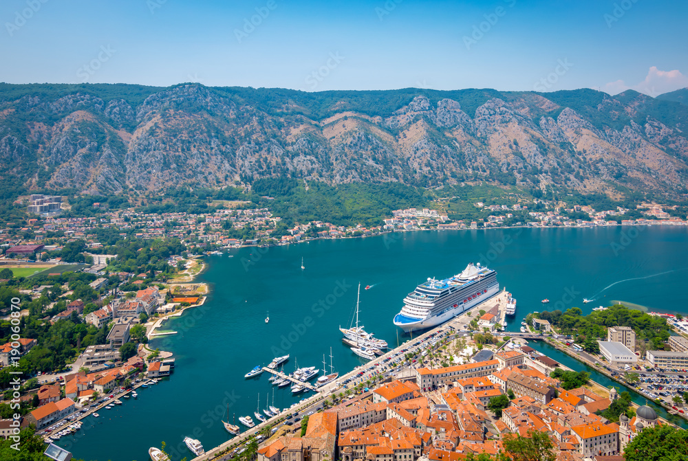 Port of Kotor, Montenegro. Aerial view with cruise ship in the background.