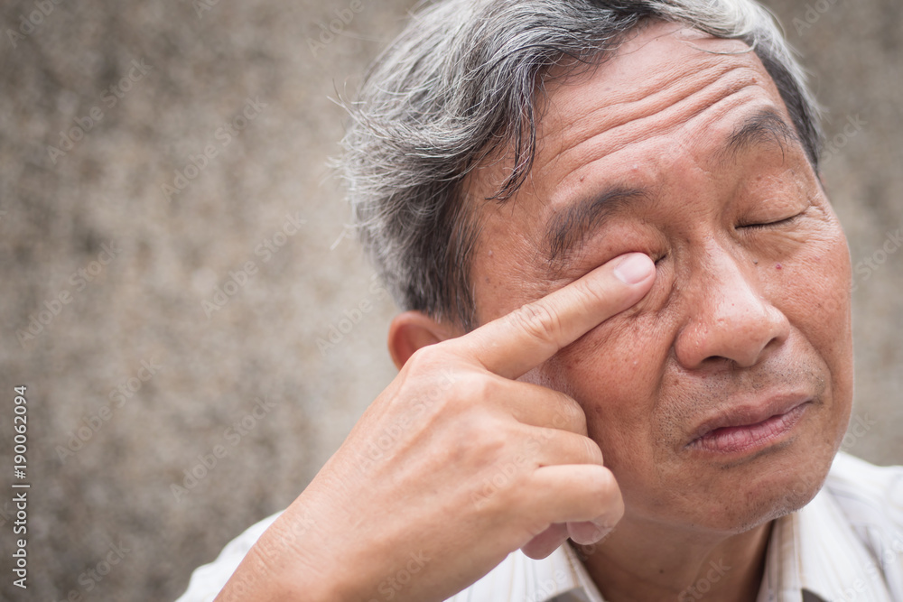 old man with eye irritation, optical problem old man with eye irritation, optical problem